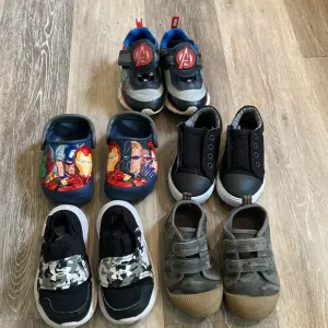 Lot of shoes.  All size 7, except the Marvel light up sneakers are size 8.