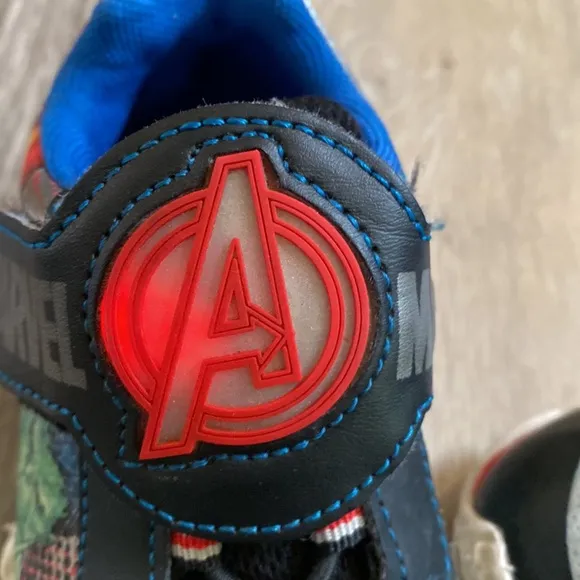 Lot of shoes.  All size 7, except the Marvel light up sneakers are size 8.