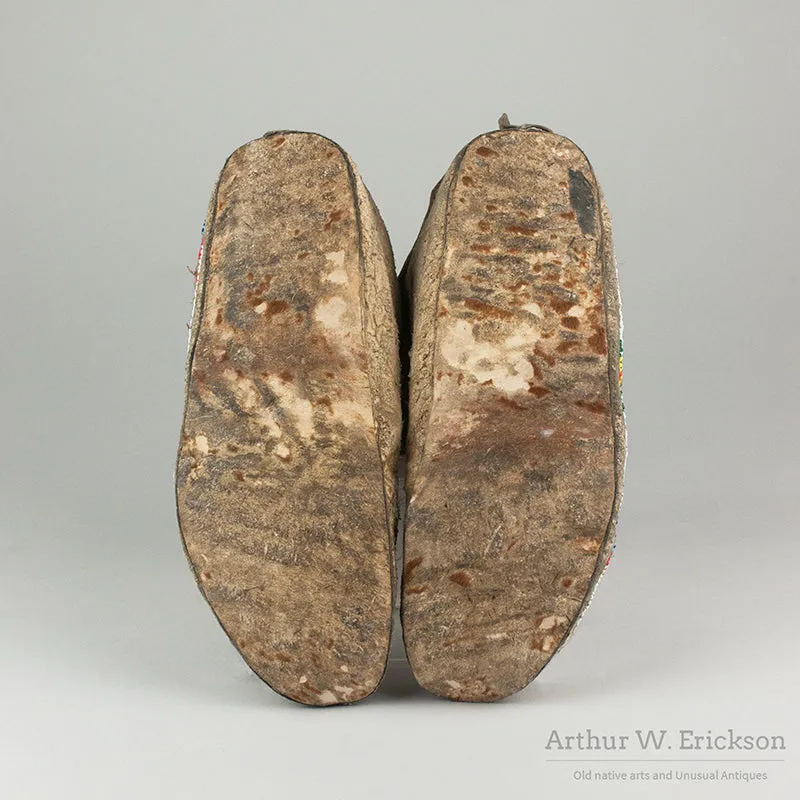 Pair of Arapaho Partially Beaded Moccasins